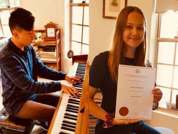 Stefanie and Joseph celebrating exam results